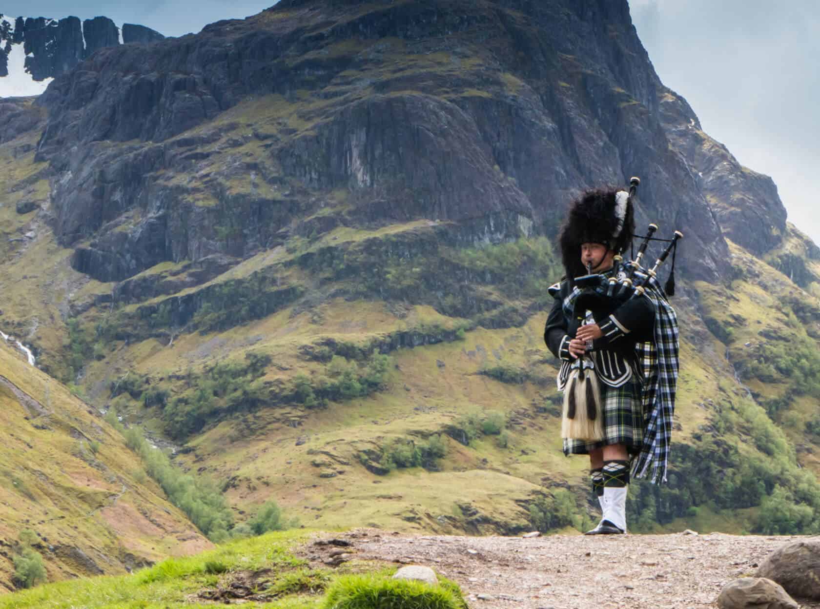 Scottish performer in mountains